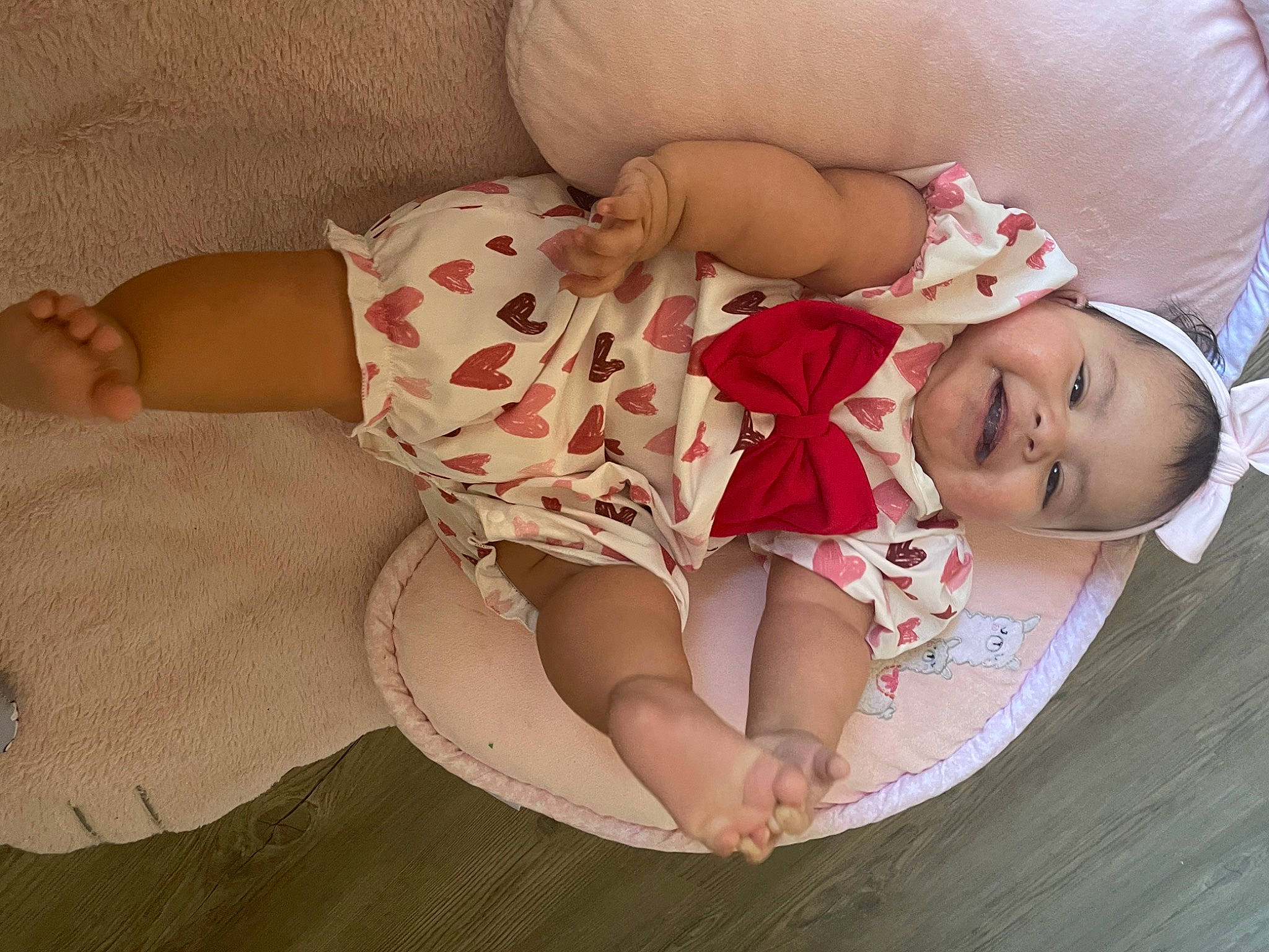 Kelly joined the competition — help win amazing prizes! baby, baby_sleeping, baby_toddler_clothing, cheek, child, comfort, finger, happy, headgear, human_body, human_leg, leg, linens, pattern, person, pink, product, skin, sleeve, thigh