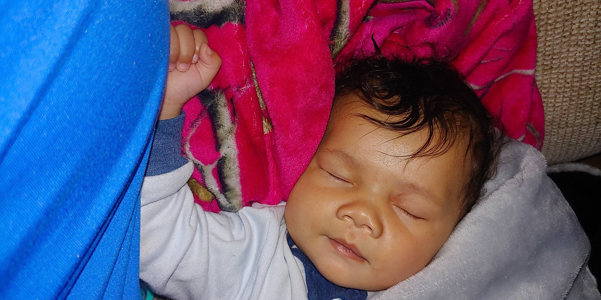 Paul is registered to the contest to win money with this photo: baby, black_hair, cheek, child, chin, comfort, eyebrow, eyelash, gesture, hair, happy, iris, lip, mouth, nose, organ, person, pink, purple, skin