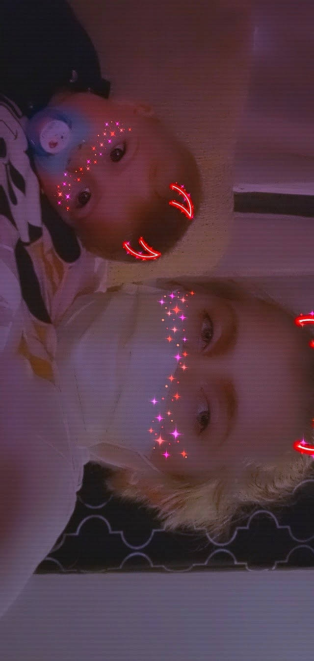 Liam joined the competition — help win amazing prizes! carmine, child, chin, christmas, christmas_decoration, christmas_lights, christmas_ornament, darkness, event, fun, holiday, lip, magenta, mouth, person, pink, plant, purple, red, space