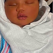 Jazelle joined the competition — help win amazing prizes! newborn, baby, sleeping, blanket, wrapped, infant, face, peaceful, closeup, soft, cute, child, portrait, indoors, skin, lips, head, comfort, rest, toddler