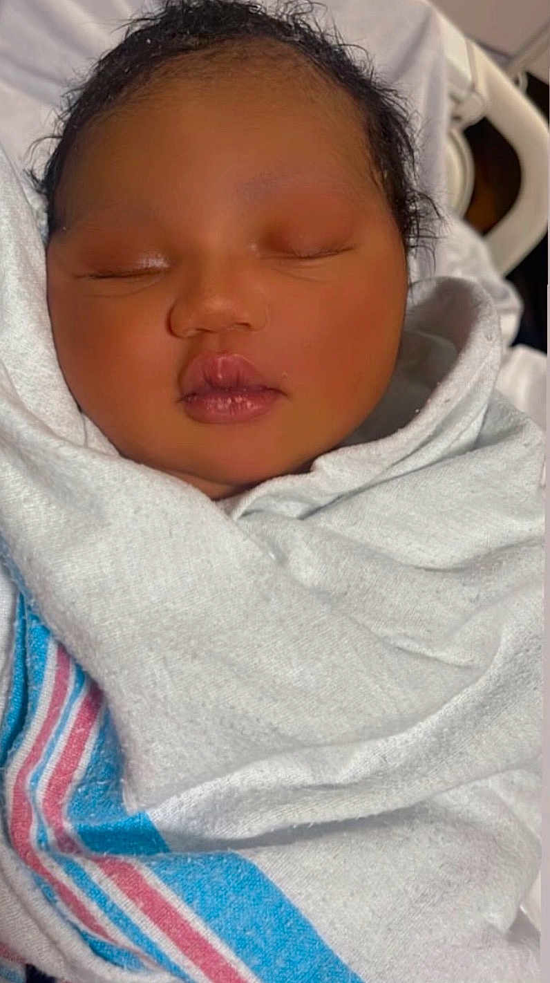 Jazelle joined the competition — help win amazing prizes! newborn, baby, sleeping, blanket, wrapped, infant, face, peaceful, closeup, soft, cute, child, portrait, indoors, skin, lips, head, comfort, rest, toddler