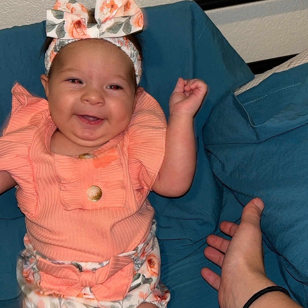 Everlee Rose is registered to the contest to win money with this photo: accessories, baby, bed, bracelet, clothing, couch, cushion, face, furniture, happy, hat, head, homedecor, indoors, jewelry, newborn, person, photography, portrait, shorts