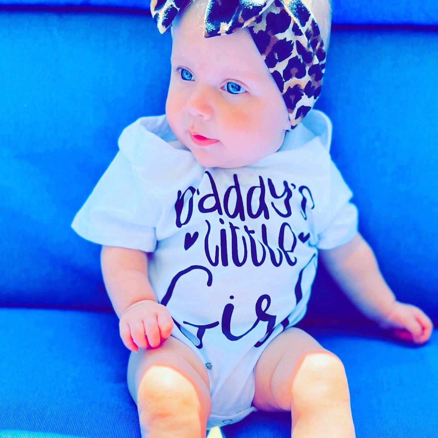 Raelyn joined the competition — help win amazing prizes! azure, baby, baby_toddler_clothing, blue, cap, cool, electric_blue, face, finger, happy, head, headgear, knee, pattern, purple, sleeve, t_shirt, thigh, toddler, white