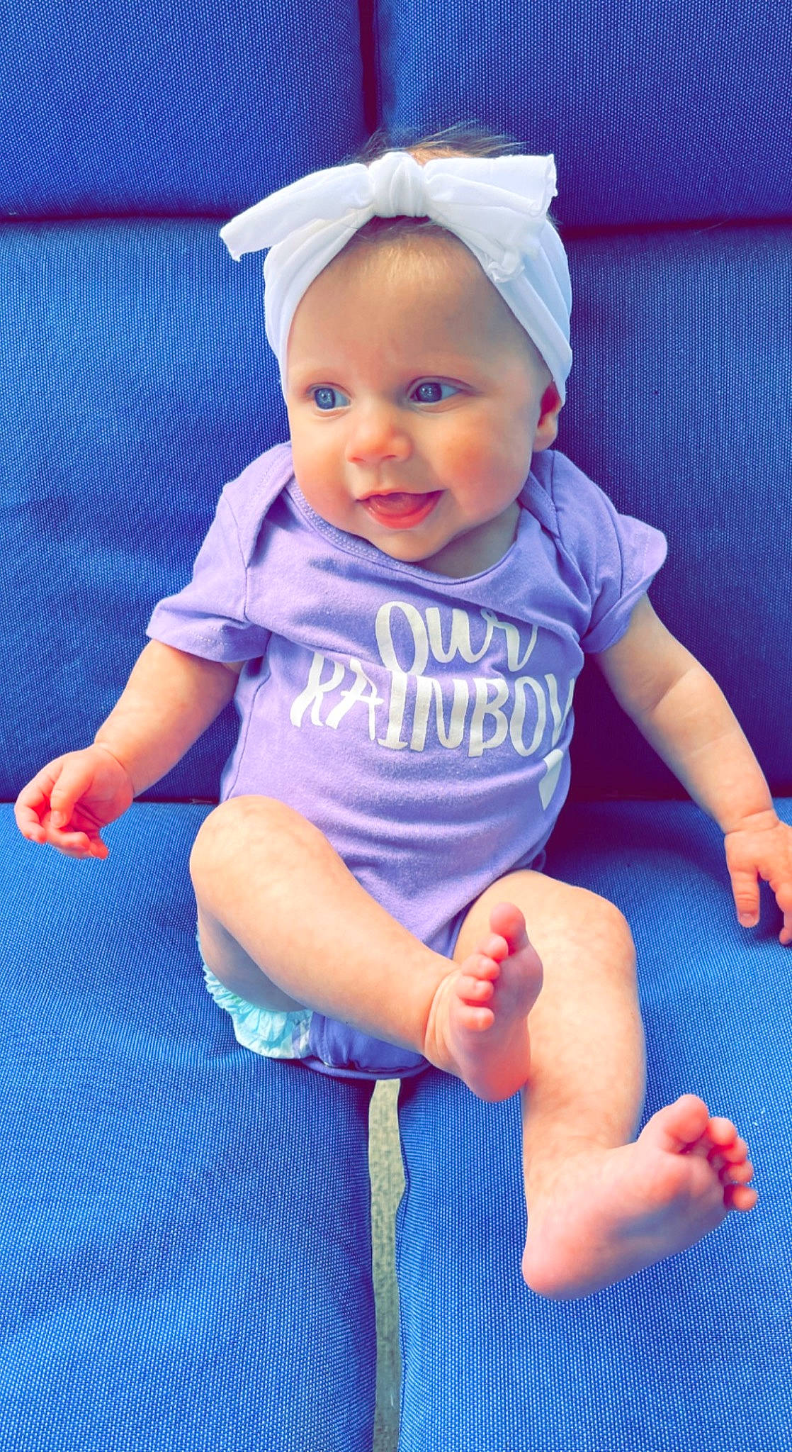 Raelyn joined the competition — help win amazing prizes! azure, baby, baby_toddler_clothing, blue, cap, cheek, cool, face, facial_expression, finger, happy, hat, head, headwear, organ, person, pink, product, purple, skin