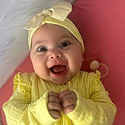 Esmae is registered to the contest to win money with this photo: accessories, baby, babylaughing, bodypart, bonnet, cap, clothing, face, finger, furniture, hand, happy, hat, head, laughing, newborn, person, photography, portrait, smile