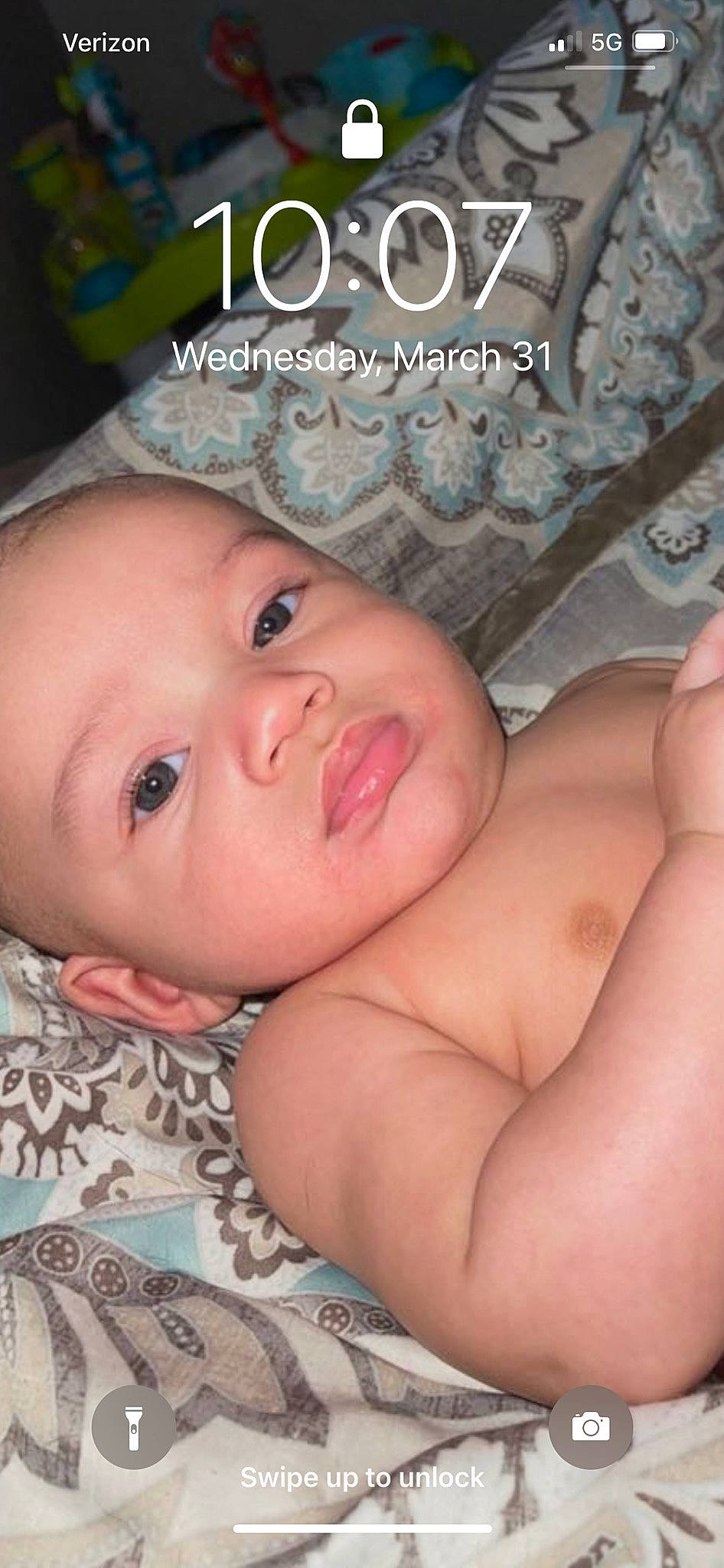 Liam is registered to the contest to win money with this photo: baby, blond, cheek, chest, child, chin, comfort, eyebrow, eyelash, face, happy, lip, mouth, muscle, nose, pattern, person, publication, skin, thumb