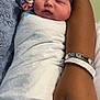 Amir is registered to the contest to win money with this photo: newborn, baby, sleeping, wrapped, blanket, hospital, arm, wristband, infant, person, skin, hand, resting, peaceful, cute, hospital_room, soft, closeup, portrait, tender