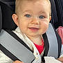 Lüna a rejoint le concours — aidez-le/la à gagner de superbes lots ! baby, child, car_seat, blue_eyes, smiling, happy, safety_harness, infant, pink_toy, white_clothing, portrait, cute, young_child, seatbelt, closeup, indoor, person, human_face, baby_toy, seat
