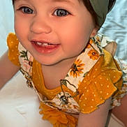 Zaiori joined the competition — help win amazing prizes! toddler, child, smiling, blue_eyes, headband, sunflower_pattern, yellow_clothing, crawling, happy, cute, baby, portrait, indoor, closeup, person, infant, skin, face, hand, young_child
