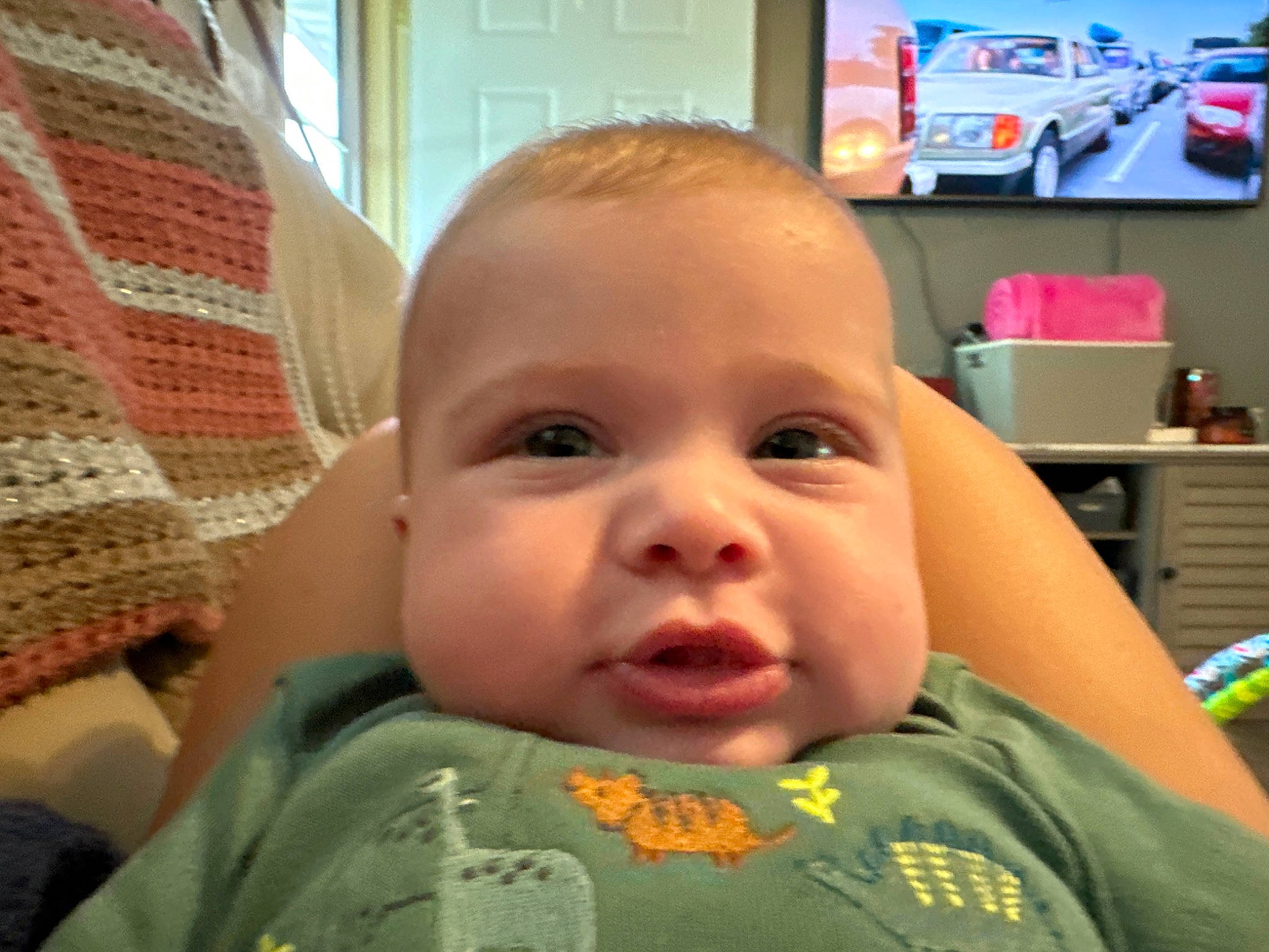 Tiger is registered to the contest to win money with this photo: baby, baby_toddler_clothing, cheek, chin, ear, eye, eyebrow, eyelash, forehead, hairstyle, happy, head, iris, lip, mouth, nose, person, picture_frame, skin, sleeve