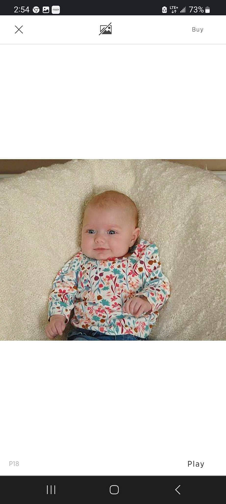 Meadow joined the competition — help win amazing prizes! baby, baby_toddler_clothing, cheek, child, collar, comfort, eye, face, grey, happy, iris, outerwear, pattern, person, rectangle, sitting, sleeve, t_shirt, textile, toddler