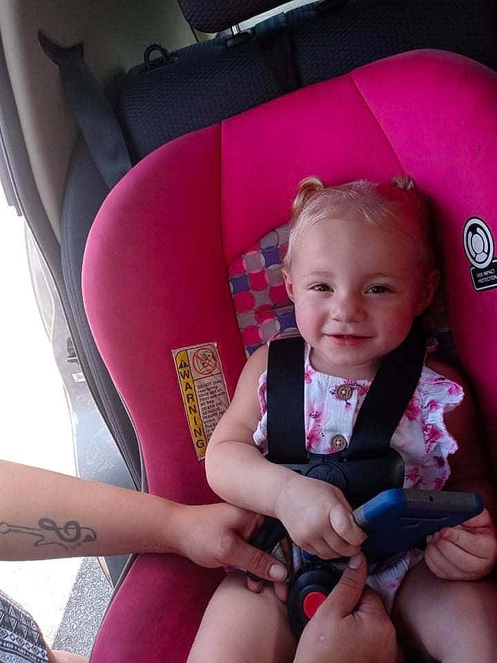Paisley joined the competition — help win amazing prizes! auto_part, baby_toddler_clothing, beauty, car_seat, comfort, facial_expression, finger, fun, happy, joy, lap, leg, magenta, person, photograph, pink, red, skin, smile, thigh