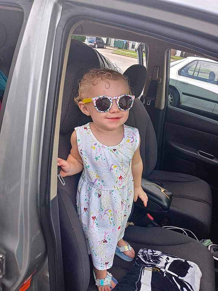 Paisley is registered to the contest to win money with this photo: auto_part, automotive_design, automotive_exterior, baby_toddler_clothing, car, car_seat, car_seat_cover, dress, eyewear, family_car, goggles, head_restraint, motor_vehicle, person, personal_luxury_car, seat_belt, sunglasses, toddler, vehicle, vehicle_door