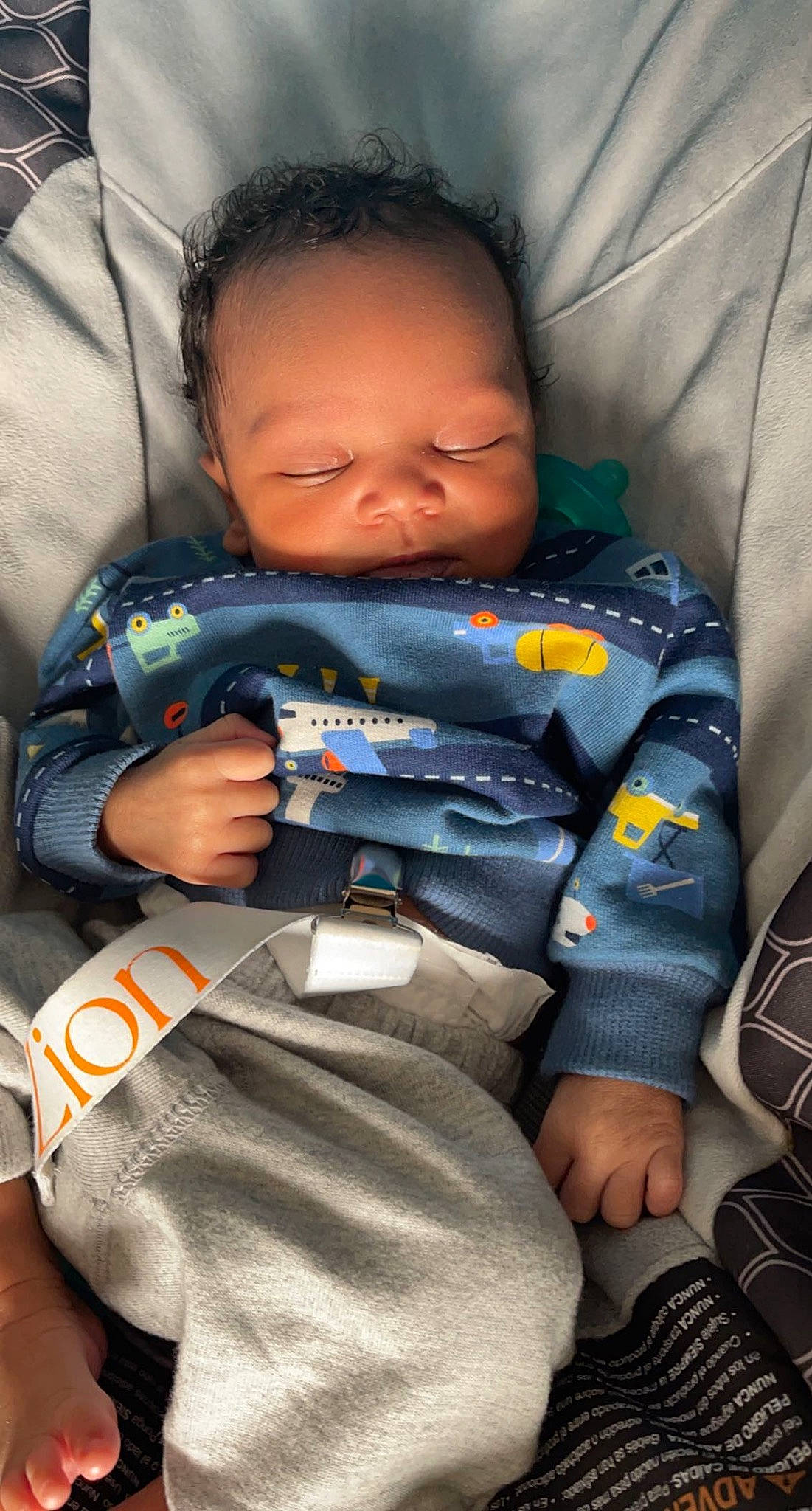 Zion joined the competition — help win amazing prizes! baby, baby_carriage, baby_in_car_seat, baby_products, baby_safety, baby_toddler_clothing, car_seat, cheek, child, comfort, electric_blue, face, finger, happy, linens, person, personal_protective_equipment, sitting, skin, thumb