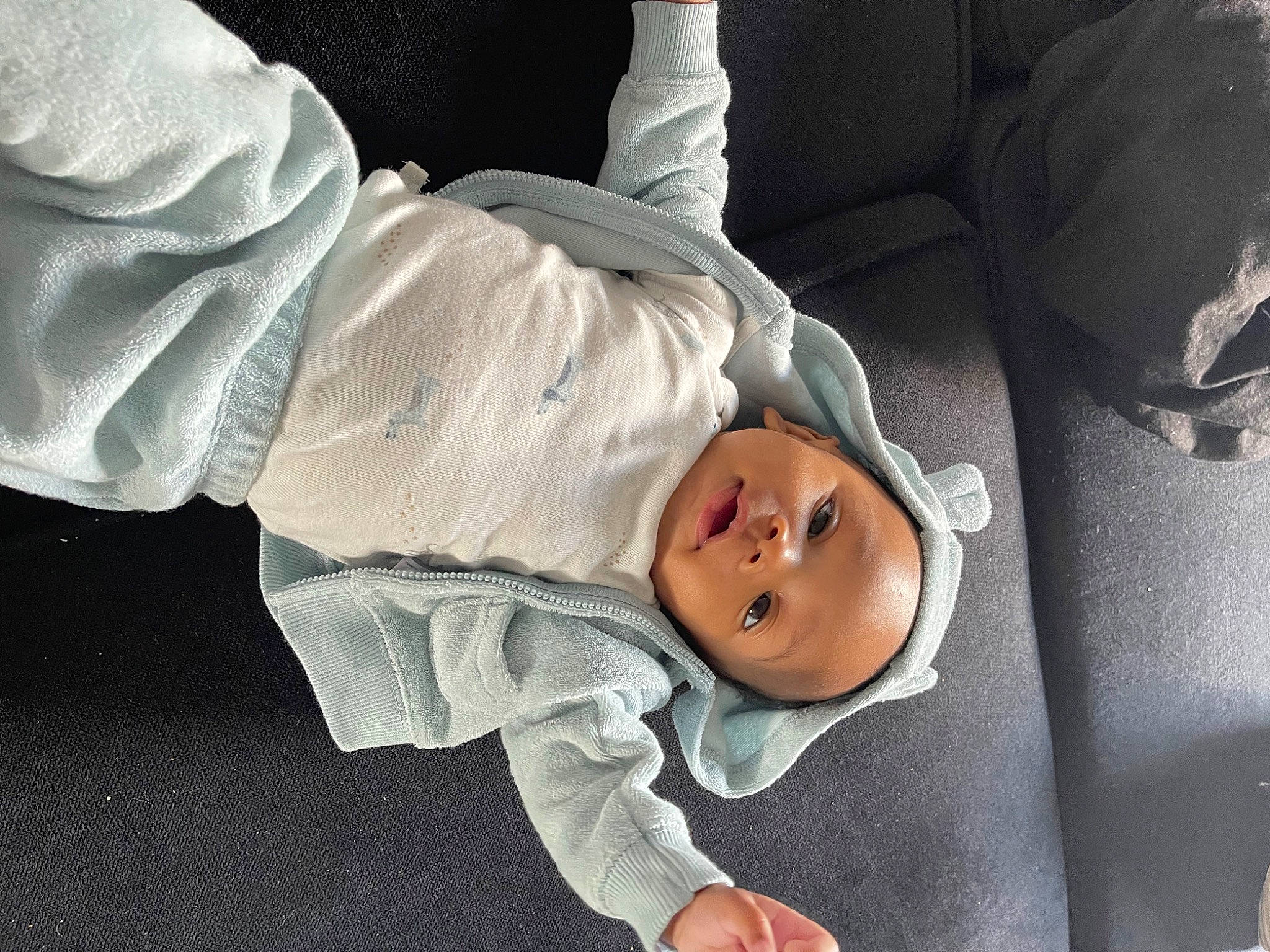 Zion joined the competition — help win amazing prizes! baby, baby_products, baby_toddler_clothing, cheek, child, comfort, finger, gesture, hat, head, headwear, human_body, human_leg, joint, mouth, person, product, sleeve, smile, textile