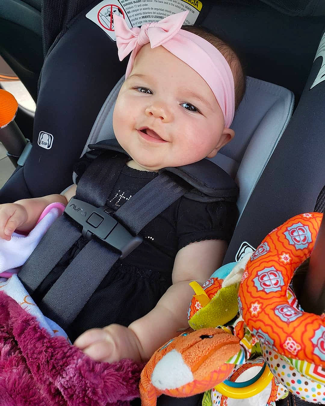 Tesla is registered to the contest to win money with this photo: baby, baby_in_car_seat, baby_products, car_seat, child, person, product, toddler