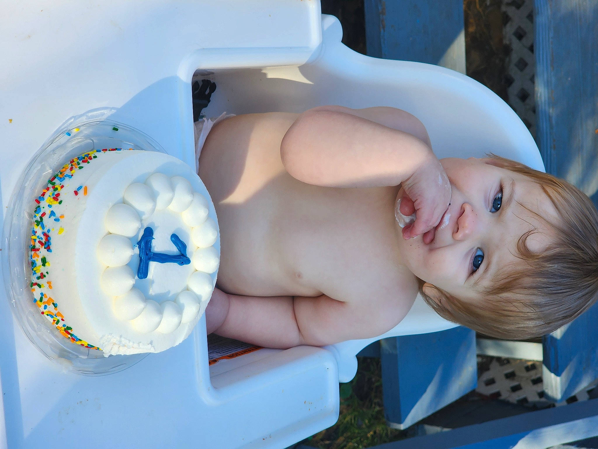 Ryland is registered to the contest to win money with this photo: abdomen, baby, baby_products, buttercream, chest, child, cream, dessert, eyelash, food, hand, linens, medical_equipment, organ, person, room, toddler