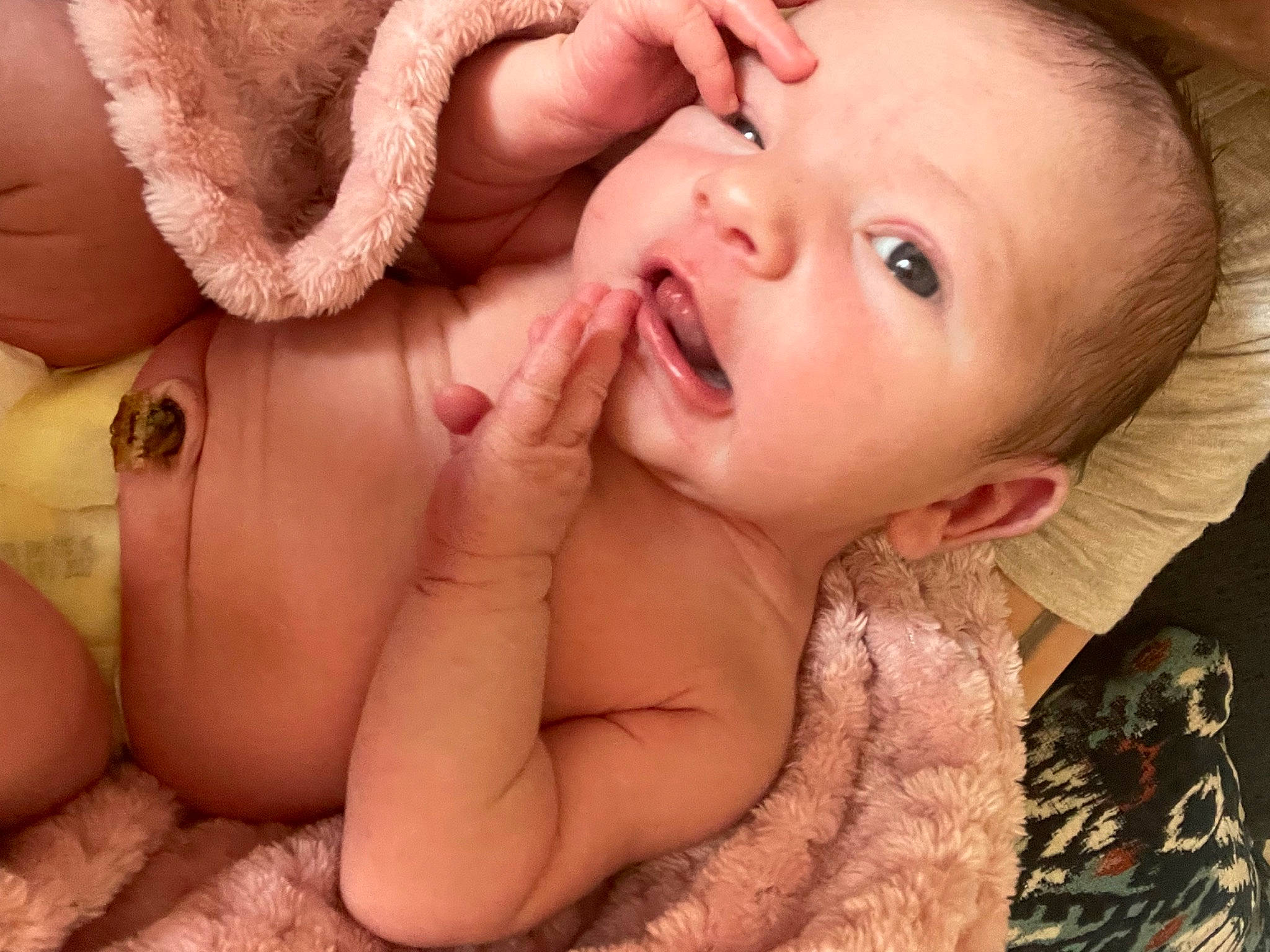 Jocelynn is registered to the contest to win money with this photo: arm, baby, cheek, ear, eyebrow, eyelash, face, finger, gesture, happy, human_body, iris, lip, mouth, neck, nose, person, pink, skin, stomach