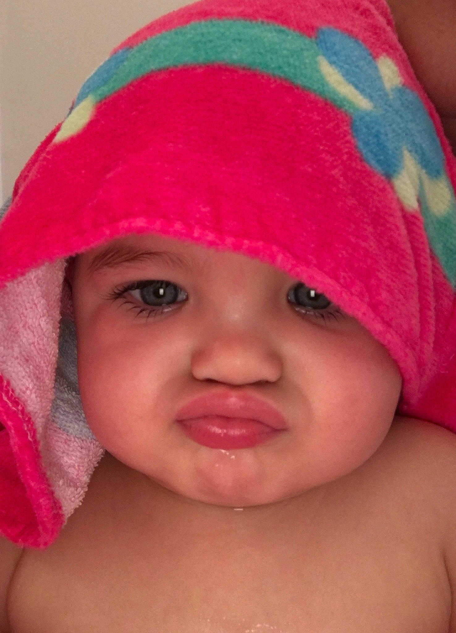 Paisley Mae is registered to the contest to win money with this photo: baby, cheek, child, chin, close_up, eye, eyebrow, face, fashion_accessory, forehead, hat, head, headgear, lip, mouth, neck, nose, person, pink, skin