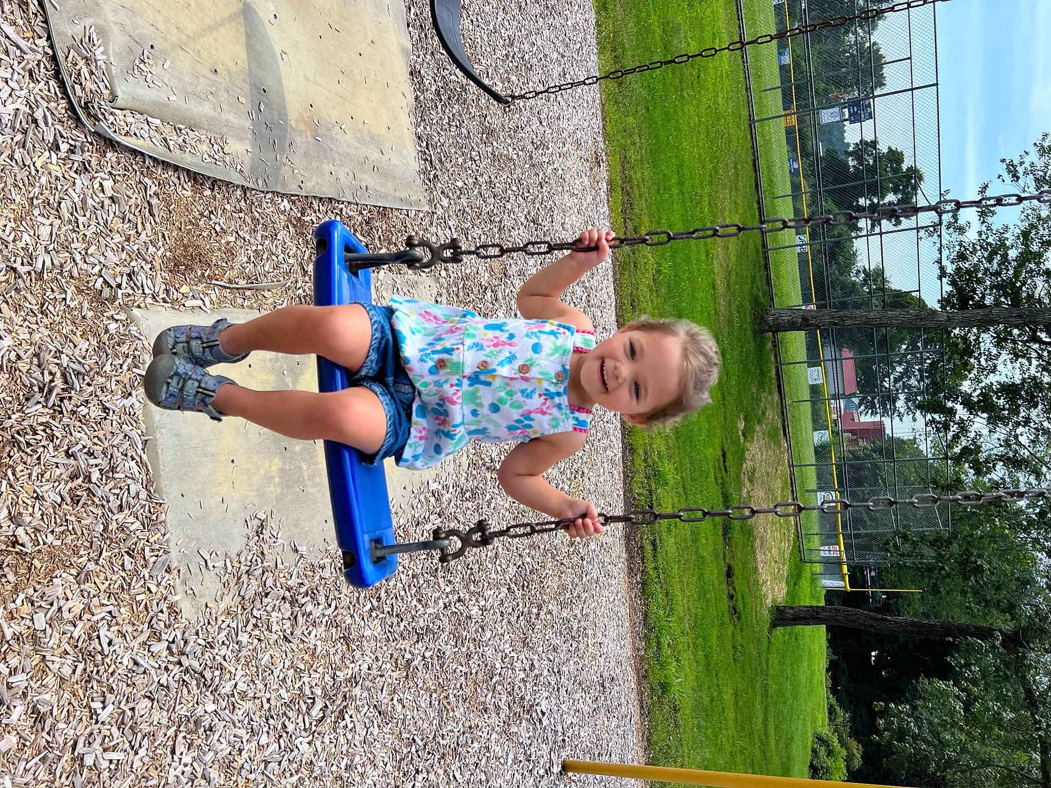 Anna Grace joined the competition — help win amazing prizes! child, city, concrete, electric_blue, fun, grass, human_leg, joy, leisure, outdoor_play_equipment, people_in_nature, person, recreation, shadow, shorts, sky, soil, t_shirt, thigh, toddler