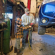 Brytton joined the competition — help win amazing prizes! adult, boots, boy, car, child, equipment, floor, garage, gas_tank, hoodie, industrial, learning, lifted_car, man, mechanic, pneumatic_tool, teamwork, tools, vehicle, workshop