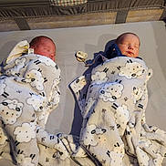 Lukah And Landon joined the competition — help win amazing prizes! newborn, baby, sleeping, blanket, crib, pacifier, sheep_pattern, twins, infant, sleep, cozy, bed, yellow, floral_pattern, soft, wrapped, cute, peaceful, indoor, person