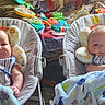 baby, infant, twin_babies, blanket, baby_seat, toys, indoor, cushion, smile, face, child, cute, comfort, striped_clothing, patterned_blanket, head_support, wooden_chair, colorful, happy, portrait