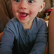 Halston joined the competition — help win amazing prizes! baby, child, infant, smiling, happy, laughing, portrait, face, blue_eyes, indoor, couch, leather, lamp, home, living_room, sitting, shirt, long_sleeves, close_up, photography