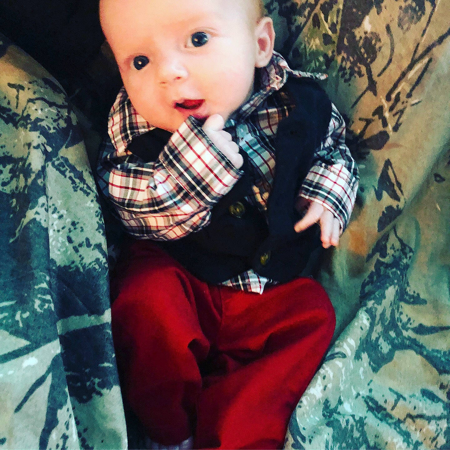 Landon is registered to the contest to win money with this photo: boy, child, cool, outerwear, pattern, person, plaid, product, textile, toddler