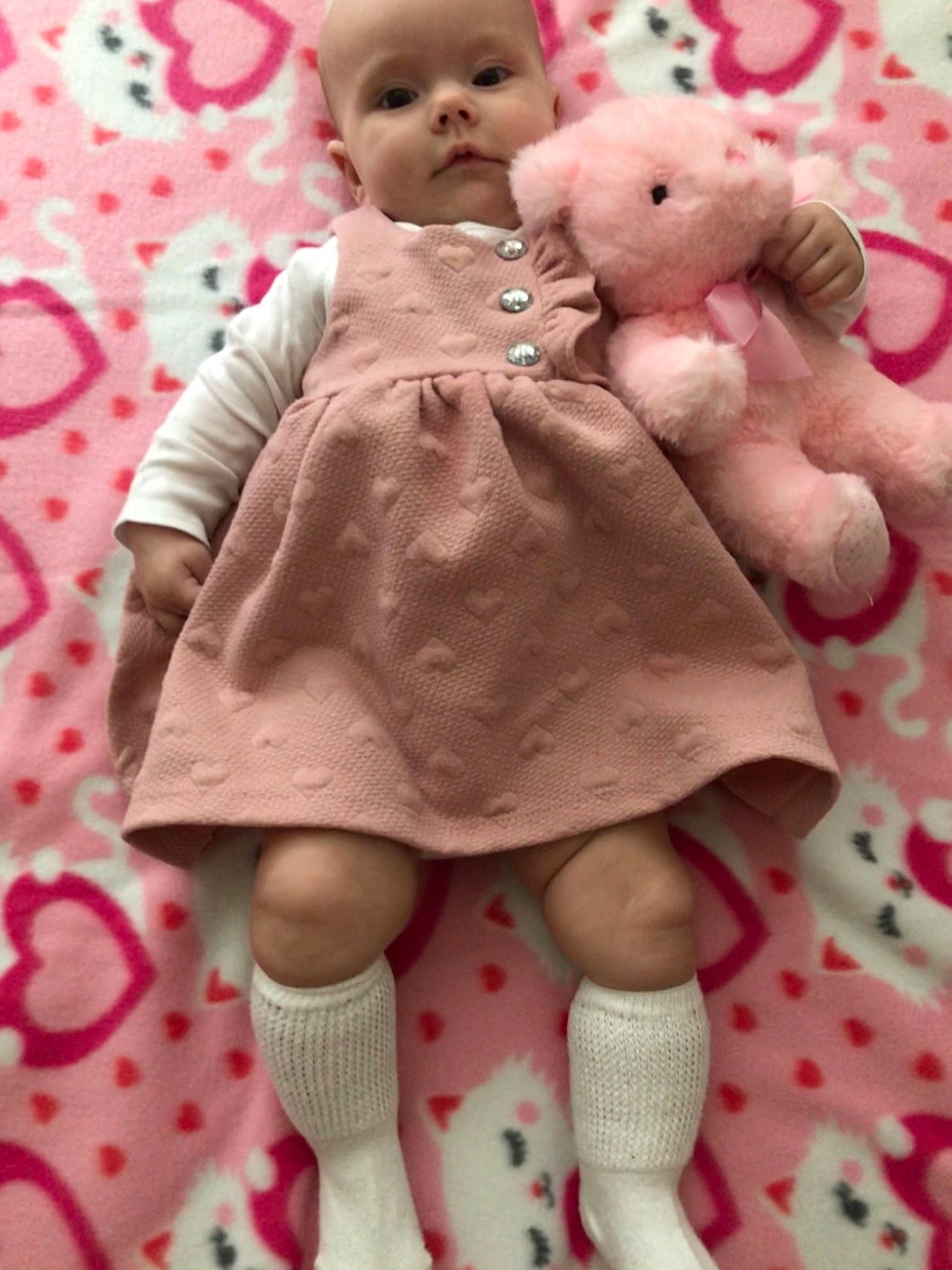 Kathy is registered to the contest to win money with this photo: baby_products, baby_toddler_clothing, baby_toys, craft, creative_arts, doll, fawn, knitting, pattern, peach, person, pink, plush, product, sock, stuffed_toy, textile, toy, wool, woolen