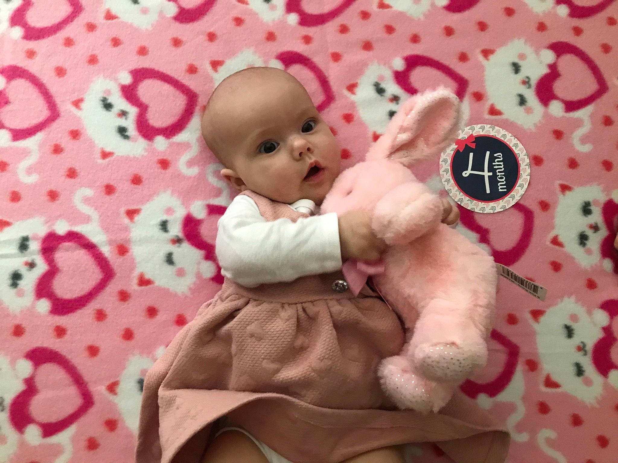 Kathy joined the competition — help win amazing prizes! baby_products, baby_toddler_clothing, baby_toys, doll, linens, pattern, peach, person, pink, plush, stuffed_toy, teddy_bear, textile, toy