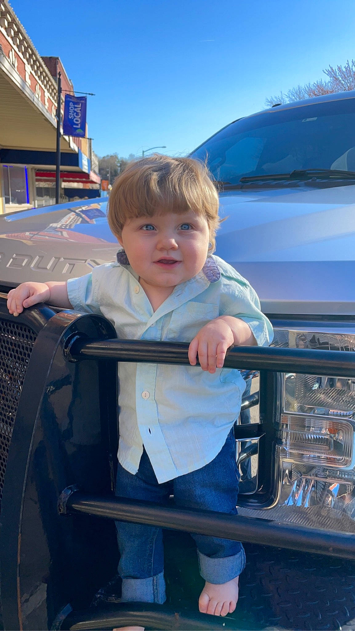 Lennox joined the competition — help win amazing prizes! auto_part, automotive_exterior, automotive_lighting, automotive_wheel_system, baby, baby_toddler_clothing, blue, bumper, car, electric_blue, fun, grille, hood, mode_of_transport, motor_vehicle, person, sky, toddler, travel, vehicle