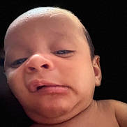 Kai joined the competition — help win amazing prizes! baby, close_up, face, skin, head, expression, curious, portrait, infant, child, human, person, young, looking, eyes, nose, mouth, chin, bare_shoulders, indoors