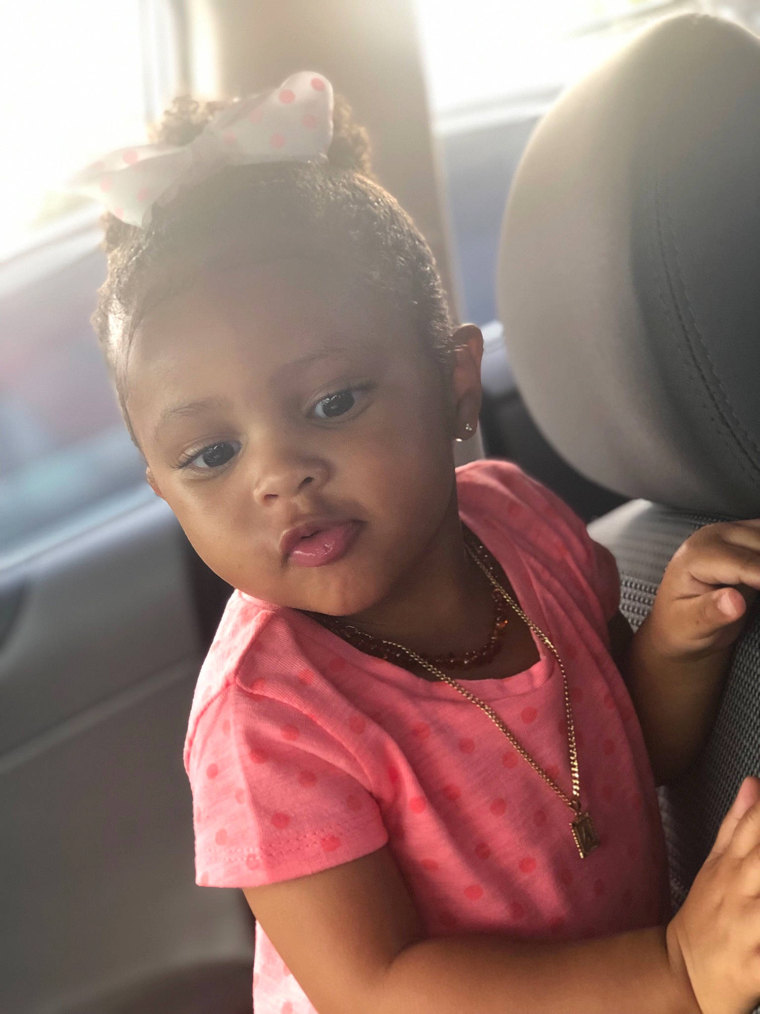 Ayvah is registered to the contest to win money with this photo: baby, black_hair, cheek, child, daughter, ear, face, forehead, hair, head, lip, neck, person, pink, skin, smile, toddler