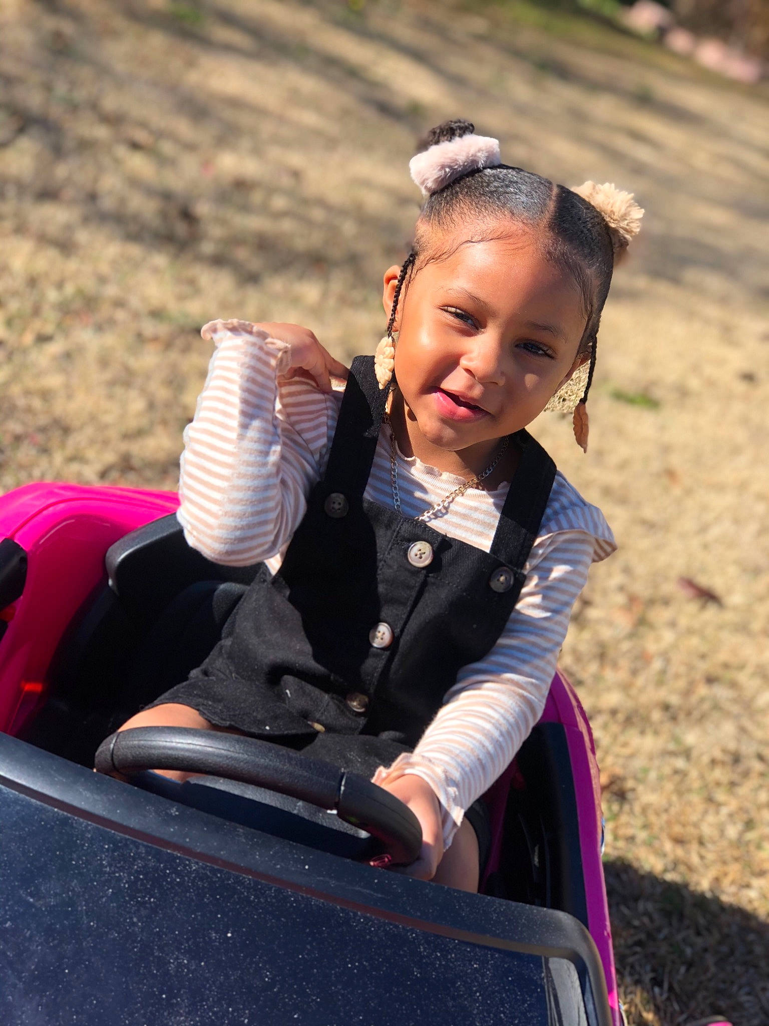 Ayvah Ruth is registered to the contest to win money with this photo: baby_products, baby_toddler_clothing, brown_hair, child, child_model, eye, hair_accessory, hair_tie, happy, headband, headpiece, mouth, nose, outdoor_play_equipment, people_in_nature, person, play, playground, portrait_photography, sitting