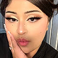 Angela E.