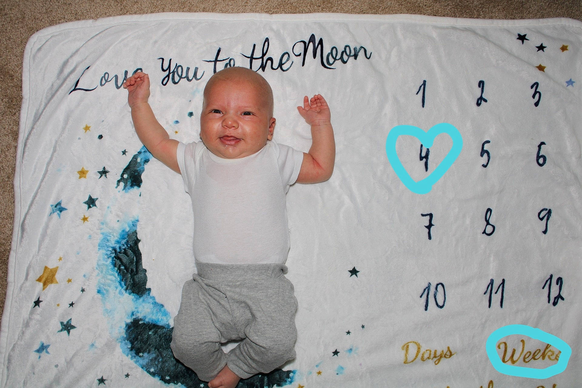 Jackson joined the competition — help win amazing prizes! baby, baby_toddler_clothing, cheek, child, comfort, facial_expression, font, fun, gesture, happy, linens, pattern, person, pink, product, room, sleeve, smile, t_shirt, textile