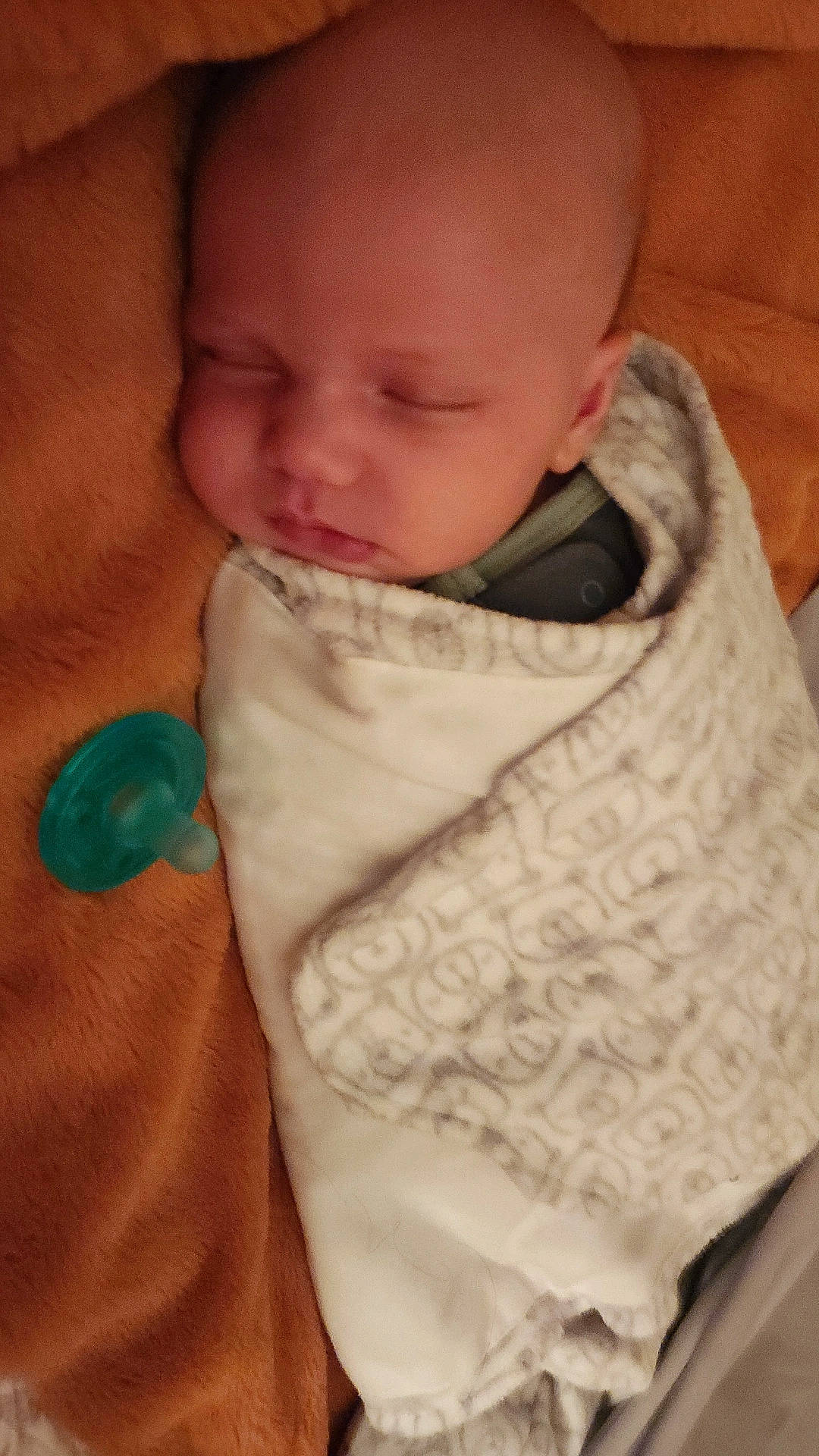 Jackson is registered to the contest to win money with this photo: baby, baby_toddler_clothing, cheek, chin, collar, comfort, eye, eyebrow, facial_expression, head, iris, lip, neck, nose, person, shawl, skin, sleeve, textile, toddler