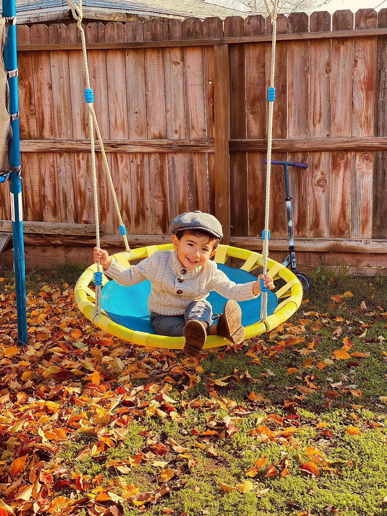 Zechariah is registered to the contest to win money with this photo: backyard, boats_and_boating_equipment_and_supplies, fun, garden, grass, groundcover, joy, landscape, landscaping, lawn, leisure, people_in_nature, person, plant, playground, recreation, shade, sitting, soil, toddler