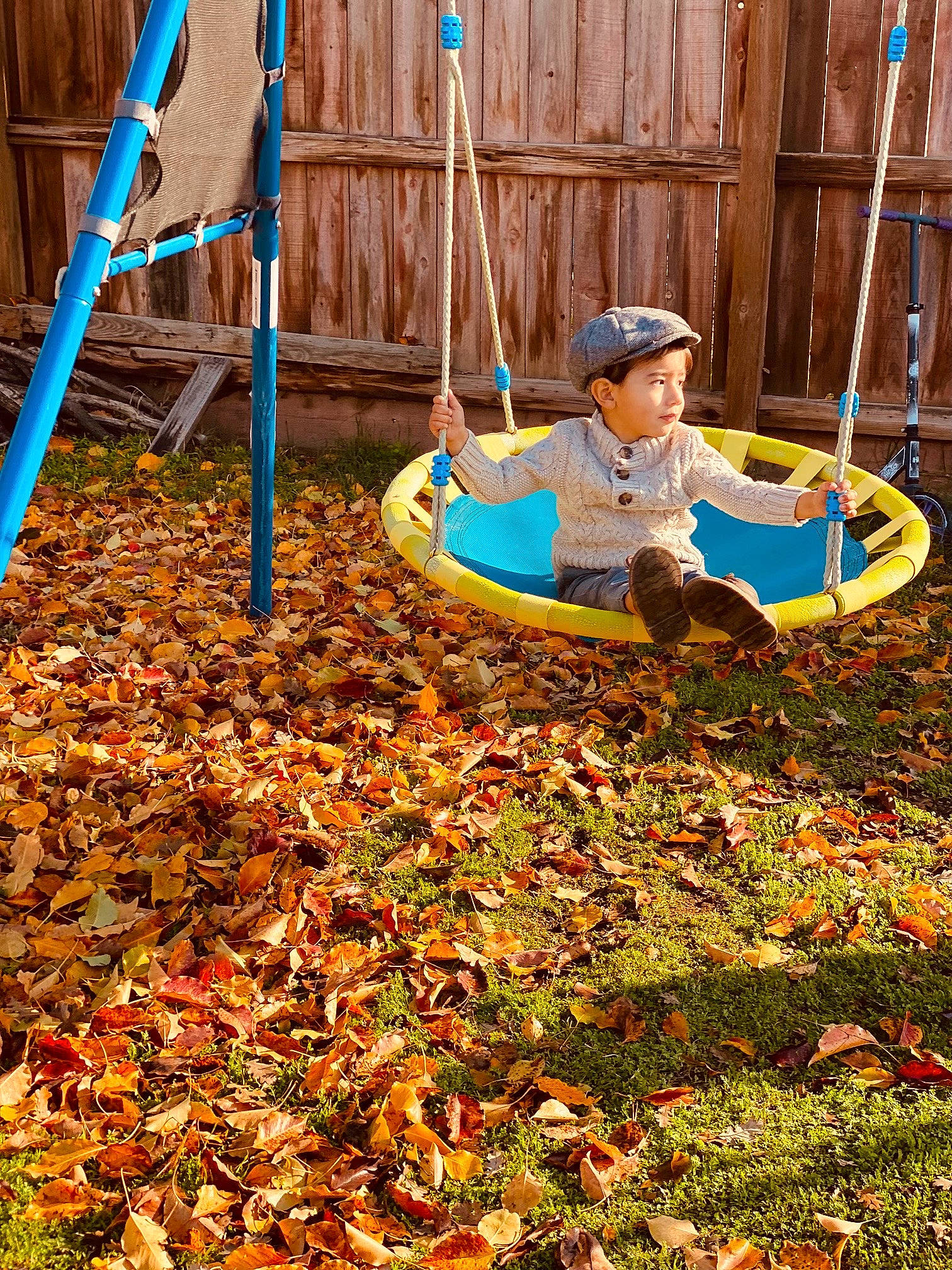 Zechariah is registered to the contest to win money with this photo: child, chute, city, deciduous, fun, grass, groundcover, headwear, ladder, leisure, outdoor_play_equipment, people_in_nature, person, play, playground, recreation, shade, soil, swing, tints_and_shades