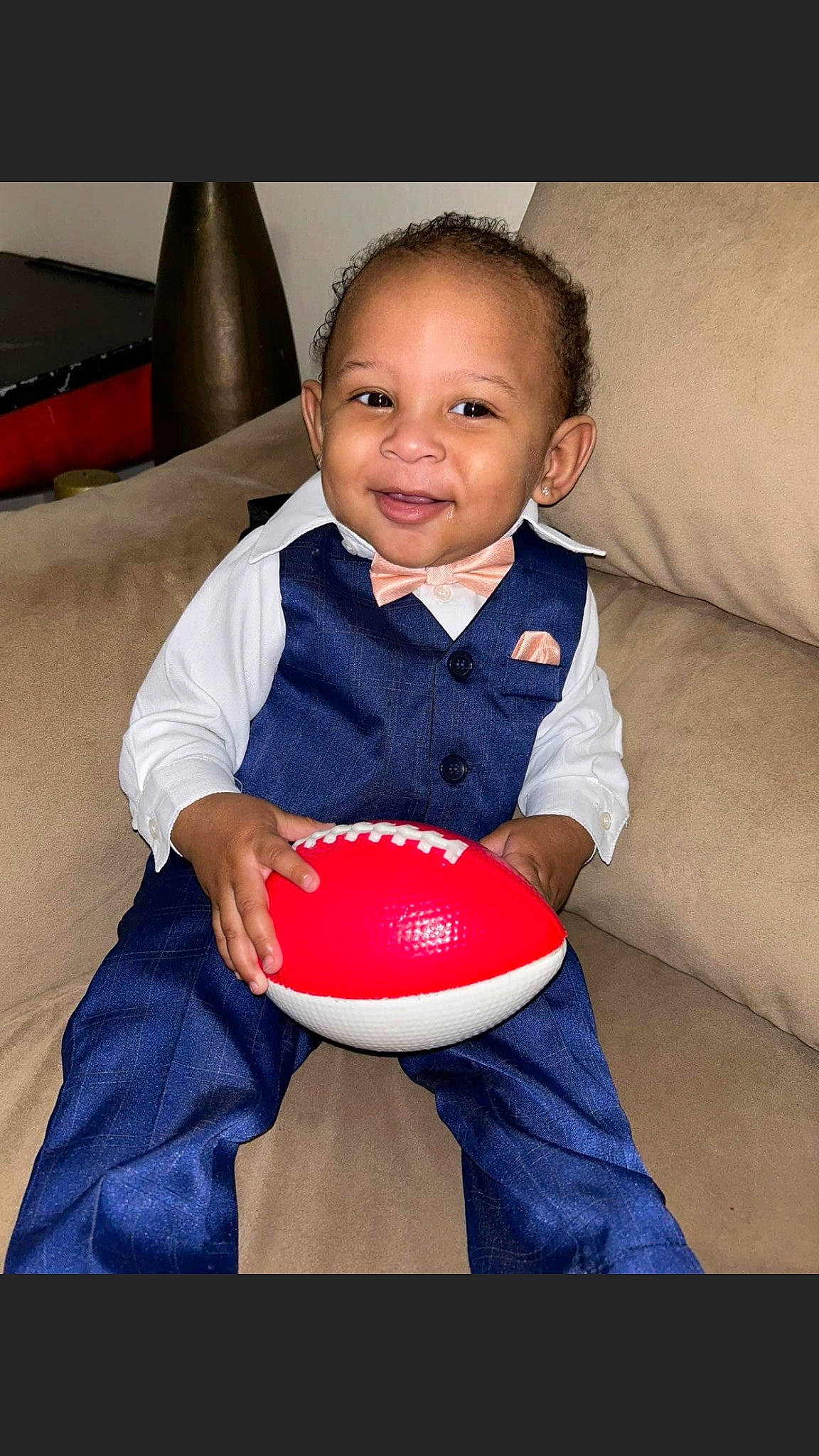 Armani joined the competition — help win amazing prizes! baby_playing_with_toys, baby_toddler_clothing, ball, carmine, child, comfort, couch, electric_blue, eye, flash_photography, flooring, fun, happy, head, joy, person, product, sitting, sleeve, smile