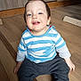 Alex a rejoint le concours — aidez-le/la à gagner de superbes lots ! child, toddler, baby, striped_shirt, sitting, wooden_floor, smile, teeth, blue_eyes, casual_clothing, socks, indoor, kitchen, cabinet, hardwood, portrait, happy, cute, person, floorboard