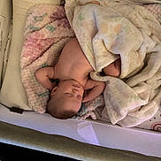 Sydney joined the competition — help win amazing prizes! arm, baby, blanket, child, comfort, cozy, crib, cushion, cute, furniture, head, indoors, infant, nap, peaceful, resting, skin, sleeping, soft, toddler