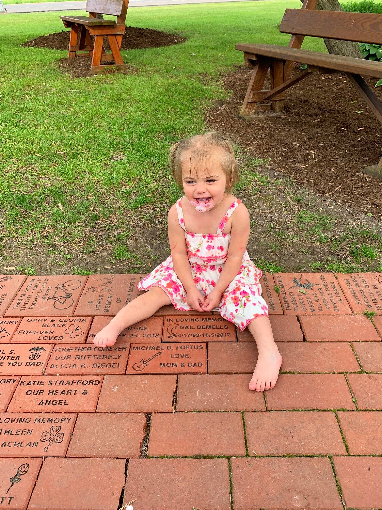 Mia Smith is registered to the contest to win money with this photo: beauty, child, flooring, fun, furniture, grass, green, joy, leaf, leg, leisure, people, person, photograph, pink, play, sitting, skin, summer, table