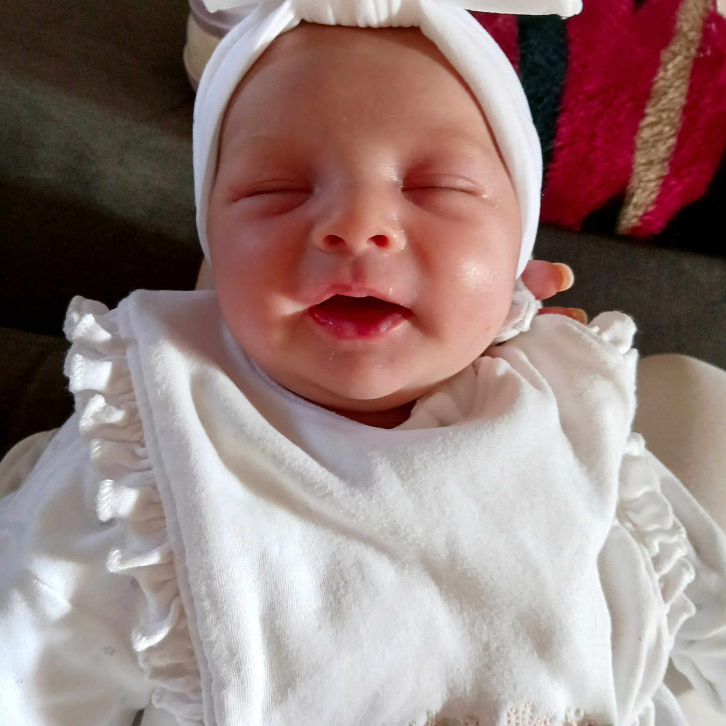 Isla-Rae is registered to the contest to win money with this photo: baby, bonnet, cap, clothing, dress, face, hat, head, newborn, person, photography, portrait, sleeping