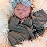 baby, basket, blanket, bow, closeup, cozy, cute, fur_blanket, headband, infant, newborn, nursery, peaceful, photography, portrait, skin, sleeping, soft_texture, swaddle, tiny_hand