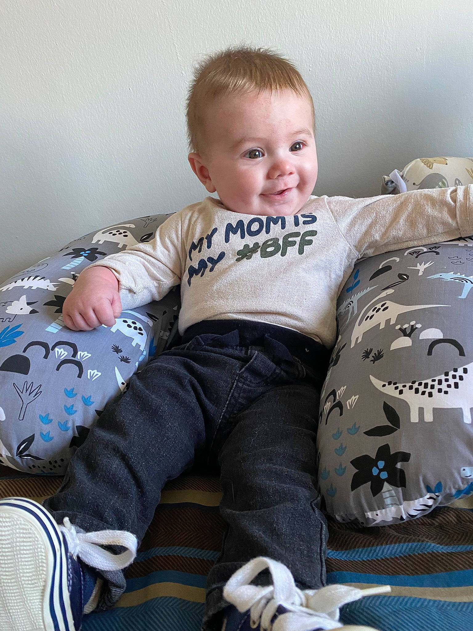 Jack joined the competition — help win amazing prizes! baby, baby_toddler_clothing, child, comfort, couch, face, happy, human_body, joy, knee, lap, linens, mammal, pattern, person, sitting, sleeve, smile, sock, t_shirt