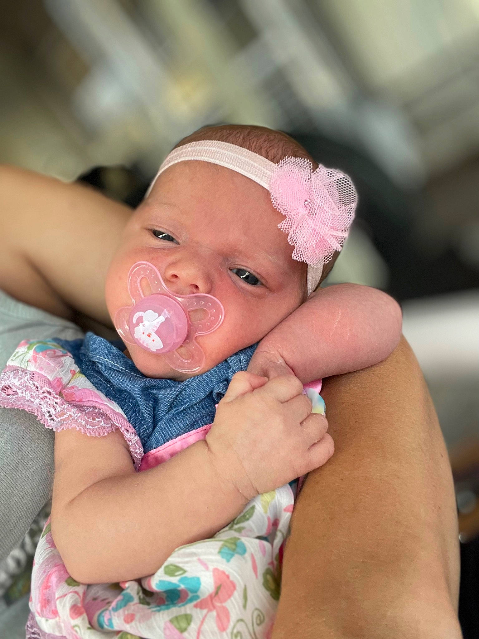 Layla is registered to the contest to win money with this photo: arm, baby, baby_products, baby_toddler_clothing, cheek, child, comfort, fashion_accessory, fun, gesture, happy, hat, iris, lip, nail, nose, person, pink, skin, thumb