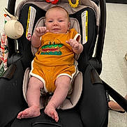 Soulstyn joined the competition — help win amazing prizes! baby, infant, car_seat, orange_clothing, toy, smiling, indoor, store, floor, feet, legs, person, child, cute, seat, play, happy, baby_toy, head, face