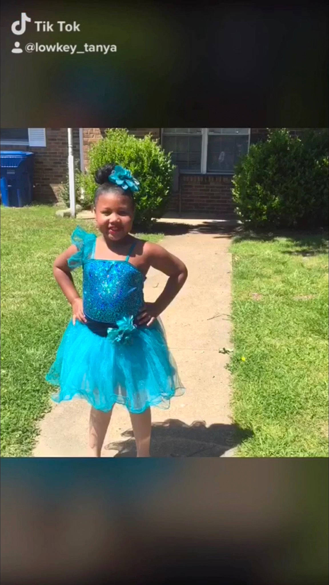 Tanya is registered to the contest to win money with this photo: child, costume, dance, dancer, dress, electric_blue, event, grass, joy, lawn, performing_arts, person, photography, toddler, turquoise